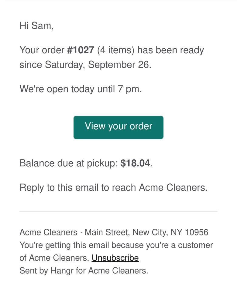The reminder email on a phone: the order has been ready since a date, the shop's hours today, a View your order button and the balance due at pickup, with Acme Cleaners' address and Unsubscribe at the foot.